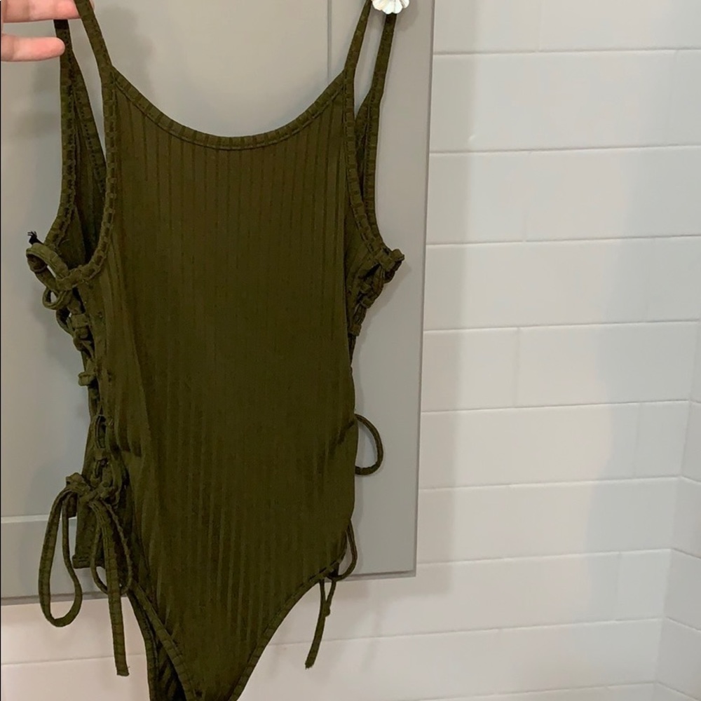 Green body suit